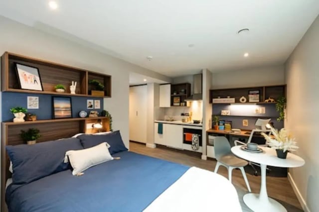 Bed kitchen desk and table studio apartment at Nelson Place in Belfast Student Accommodation