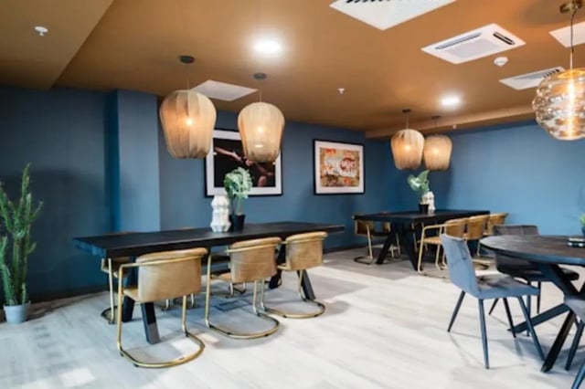 Dining tables and chairs communal area at Nelson Place in Belfast Student Accommodation