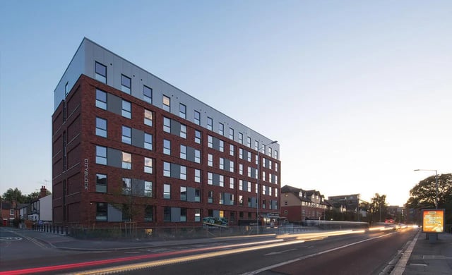 Red brick building with many windows exterior at Berkshire House Reading in Reading Student Accommodation