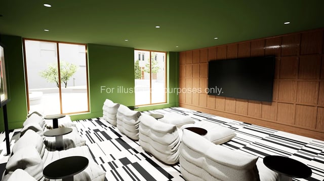 White sofas black tables wood paneling TV living room at The Sail Works in Lancaster Student Accommodation