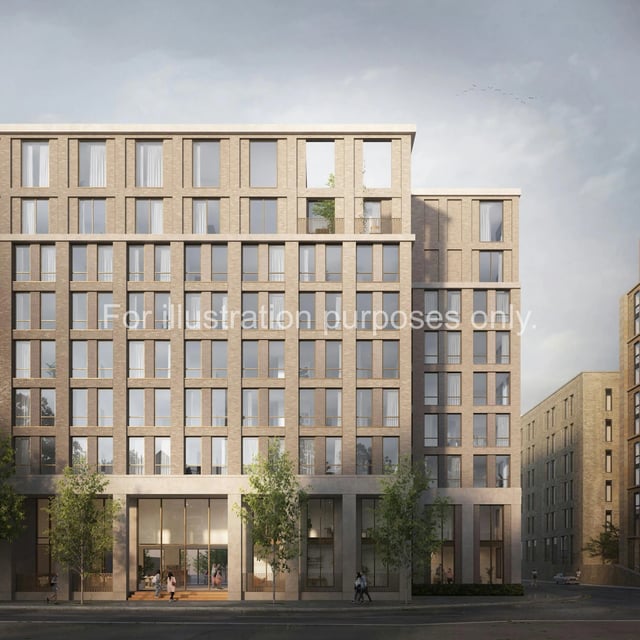 Modern brick building with glass entrance and trees exterior at The Sail Works in Lancaster Student Accommodation