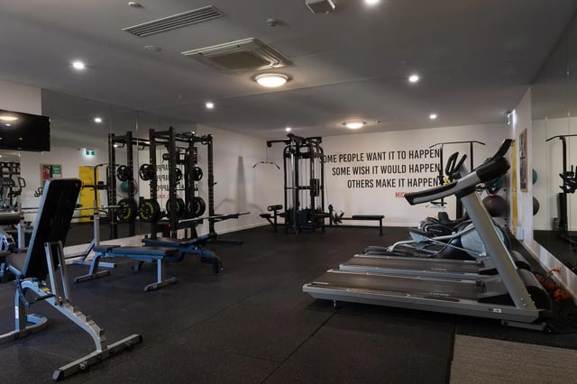 Treadmills weight racks benches gym equipment gym at dwell East End Adelaide in Adelaide Student Accommodation
