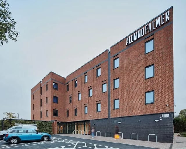 Brick building Alumno Falmer entrance exterior at Alumno Falmer in Brighton Student Accommodation