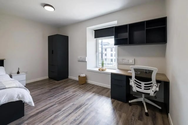 Bed wardrobe desk chair and shelves bedroom at Lyon Street Terrace in Dundee Student Accommodation