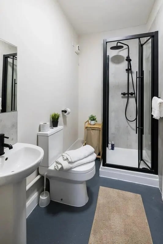 Toilet sink and shower in modern bathroom. at Lyon Street Terrace in Dundee Student Accommodation