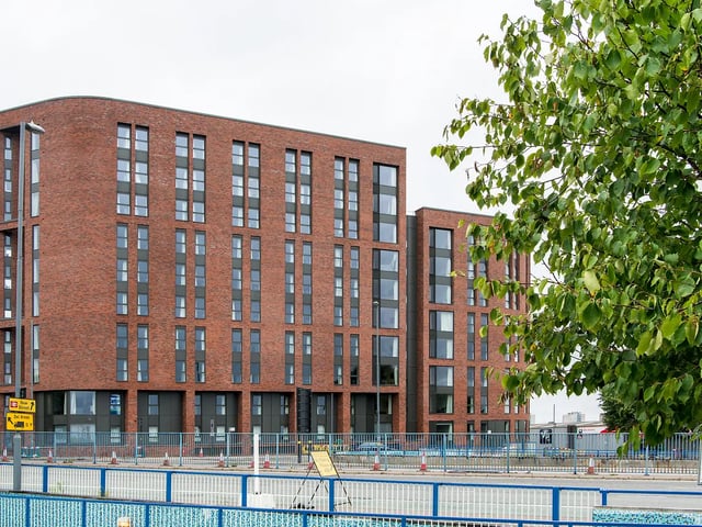 Brick student accommodation building with many windows exterior at Yugo Bentley House in Birmingham Student Accommodation