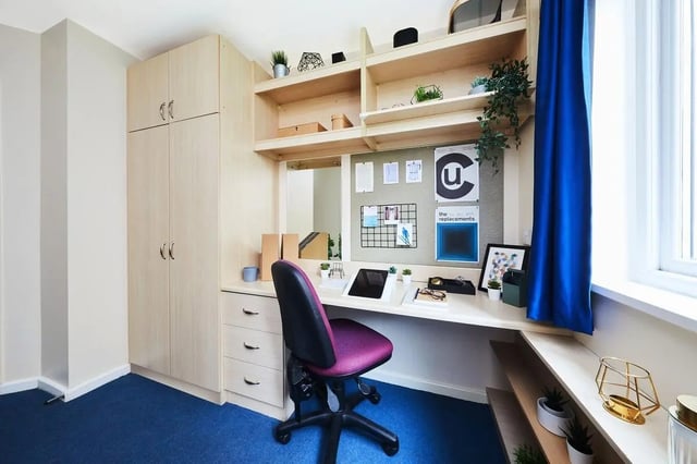 Desk chair cabinet and shelves study area at Collegiate Shaftesbury Hall in Cheltenham Student Accommodation