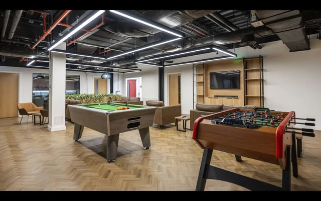 Pool table foosball table lounge area living room at Medici in Nottingham Student Accommodation