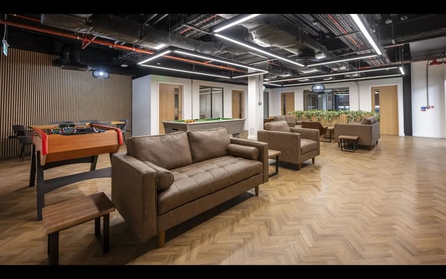 Foosball table pool table sofas living area at Medici in Nottingham Student Accommodation