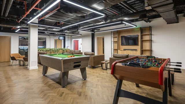 Pool table foosball table seating living room at Medici in Nottingham Student Accommodation