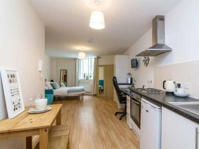 Bed desk and kitchen area studio apartment at dwell Castle Gate Haus in Nottingham Student Accommodation