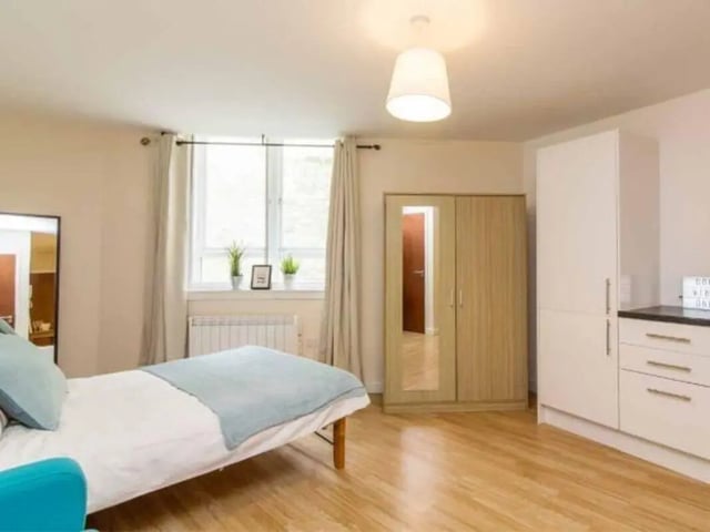 Bed mirror wardrobe kitchen cabinets studio apartment at dwell Castle Gate Haus in Nottingham Student Accommodation