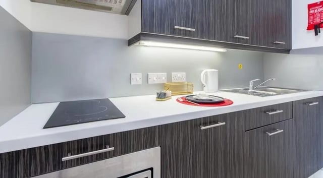 Induction hob sink kettle cabinets kitchen at Queens Gate in Southampton Student Accommodation