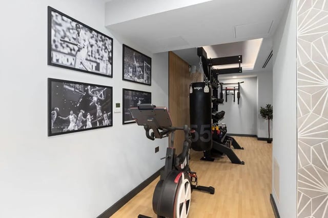 Spin bike punching bag weights framed sports art fitness room at Brunswick Apartments in Southampton Student Accommodation
