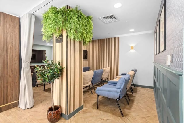 Chairs and plants in a lounge area at Brunswick Apartments in Southampton Student Accommodation