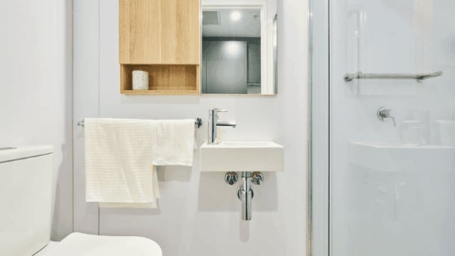 Toilet sink and shower unit bathroom at UniLodge Melbourne Flagstaff in Melbourne Student Accommodation