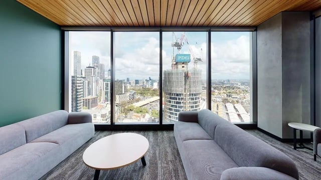 Two grey sofas and coffee table living room at Unilodge Melbourne City in Melbourne Student Accommodation