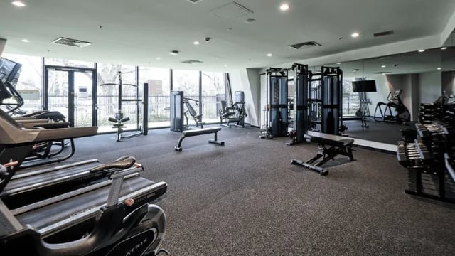 Treadmills weight machines benches gym equipment fitness area at UniLodge Park Avenue in Melbourne Student Accommodation