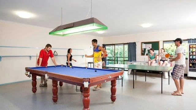 Pool table ping pong tables people playing recreation area at Unilodge SCU Lismore Orion in Lismore Student Accommodation