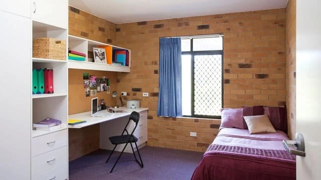 Desk bed shelves and chair bedroom at Unilodge SCU Lismore Orion in Lismore Student Accommodation