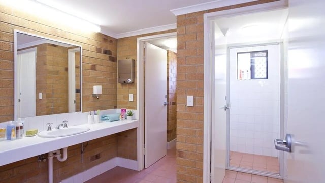 Sink mirror and shower stall bathroom at Unilodge SCU Lismore Orion in Lismore Student Accommodation