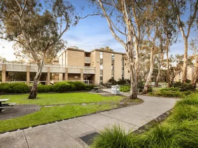 Brick building with covered walkway exterior at La Trobe University - Glenn College in Melbourne Student Accommodation