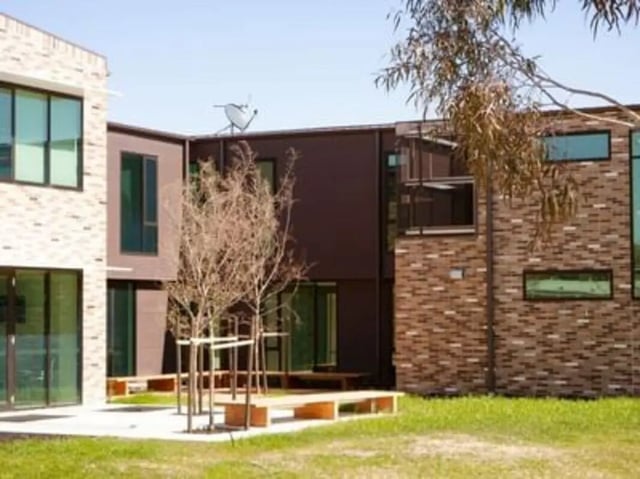 Modern buildings with outdoor seating exterior at La Trobe University - McFarlane's Hill Residences in Wodonga Student Accommodation