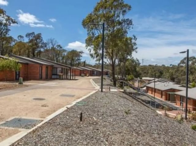 Student accommodation buildings with pathways and trees exterior at La Trobe University - Terraces in Melbourne Student Accommodation