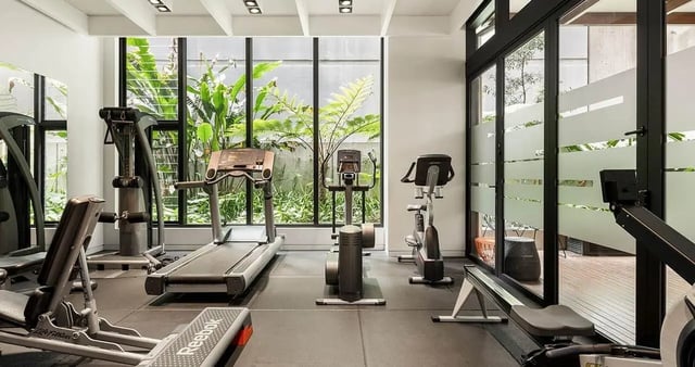 Treadmill elliptical rower weight bench gym area at @the Lodge UNIVERSITY LIVING in Weatherford Student Accommodation