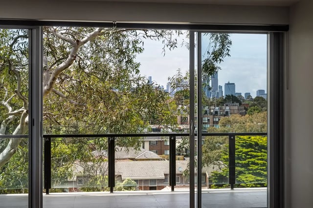 Balcony with city view and trees balcony view at UKO Royal Park in Melbourne Student Accommodation