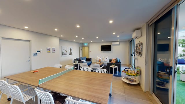 Ping pong table sofas and lounge area common room at UKO West Ryde in Sydney Student Accommodation