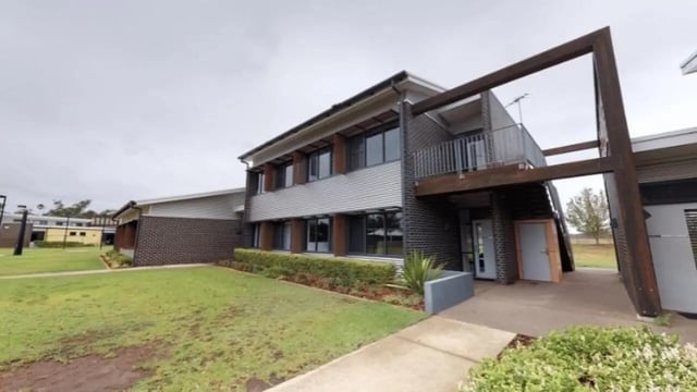 Modern building with brick and metal siding exterior at Western Sydney University Hawkesbury Village in Sydney Student Accommodation