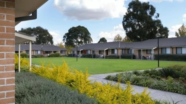 Low-rise buildings with manicured lawns exterior at Western Sydney University Hawkesbury Village in Sydney Student Accommodation