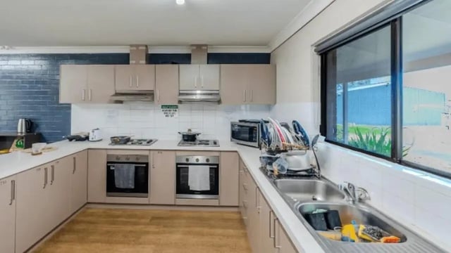 Kitchen with ovens and sink Kitchen at Western Sydney University Hawkesbury Village in Sydney Student Accommodation