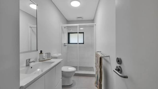 Sink toilet shower and towel rack bathroom at Western Sydney University Penrith Village in Sydney Student Accommodation