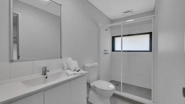 Sink toilet shower with window bathroom at Western Sydney University Penrith Village in Sydney Student Accommodation