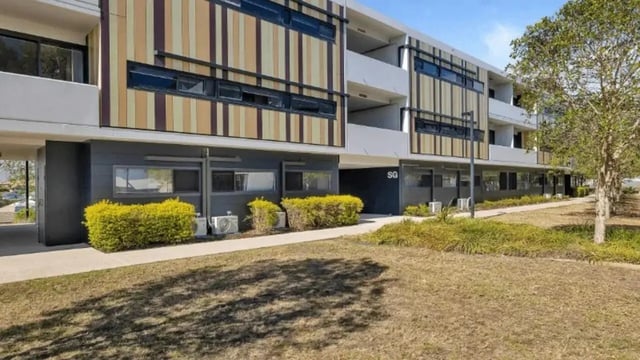 Modern building exterior with balconies and windows exterior at Western Sydney University Penrith Village in Sydney Student Accommodation