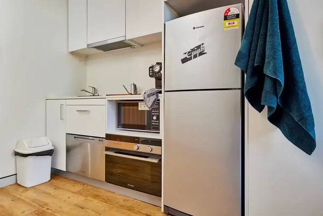 Fridge microwave oven bin dishwasher kitchen at Scape at University of Sydney in Sydney Student Accommodation