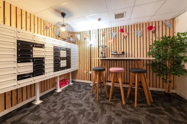 Mailboxes bar with stools and plant communal area at Studio 58 in Bristol Student Accommodation