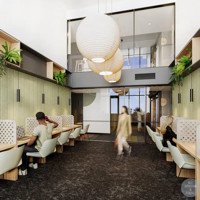 Students study at desks with partitions common area at EPIISOD Macquarie Park in Sydney Student Accommodation