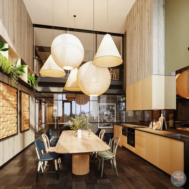 Dining table with chairs and kitchen area communal space at EPIISOD Macquarie Park in Sydney Student Accommodation