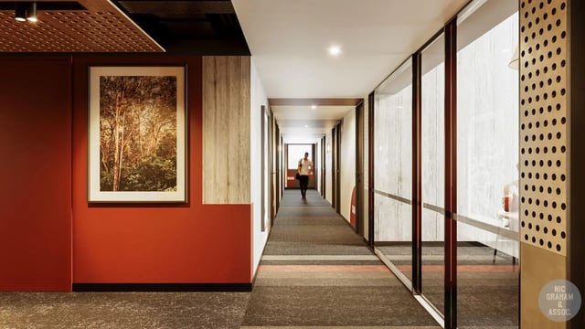 Hallway with artwork and person walking hallway at EPIISOD Macquarie Park in Sydney Student Accommodation