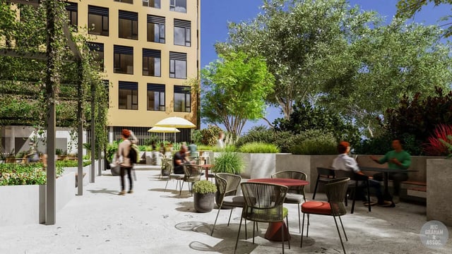 Outdoor seating with umbrellas and greenery exterior at EPIISOD Macquarie Park in Sydney Student Accommodation