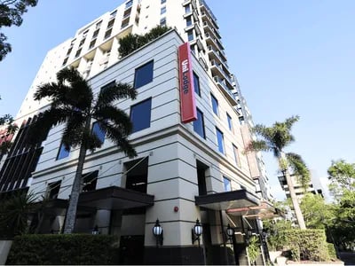 Tall building with UniLodge sign exterior at Student Living - Shafston in Brisbane Student Accommodation