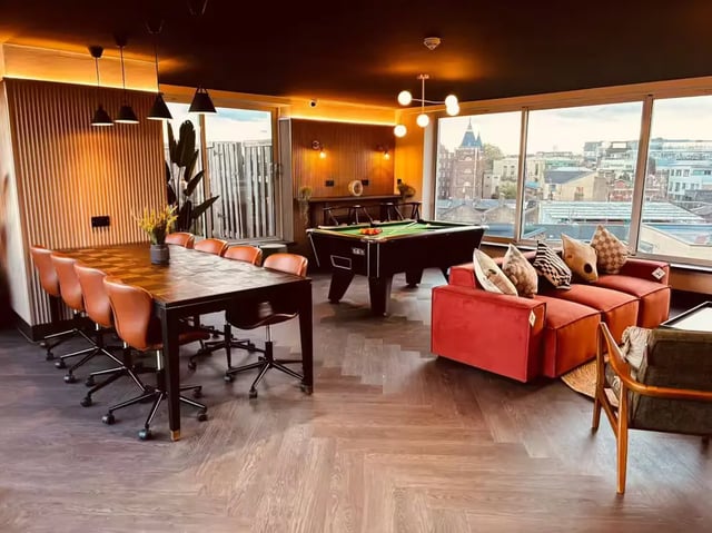 Pool table lounge area with dining table living room at Camden Hawley Crescent in London Student Accommodation