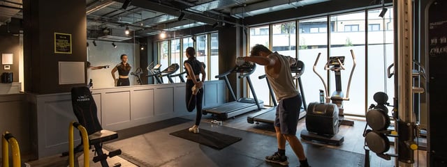 Treadmills ellipticals and weight machine gym at The Valentine London in London Student Accommodation