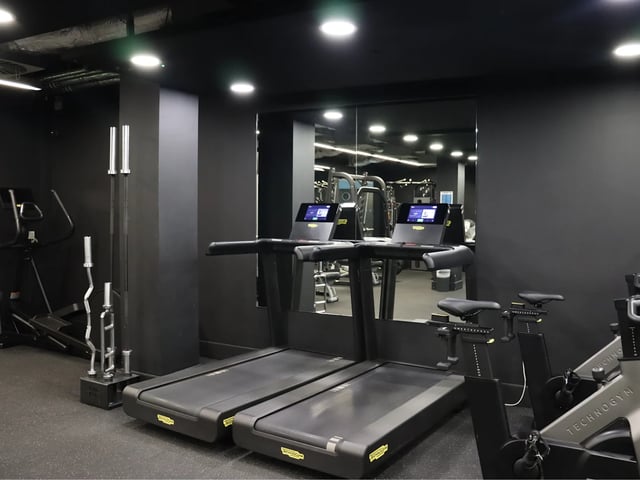 Treadmills exercise bikes barbells gym at Spring Mews in London Student Accommodation