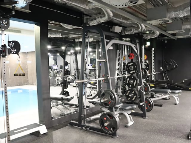 Weight racks exercise machines swimming pool Gym at Spring Mews in London Student Accommodation