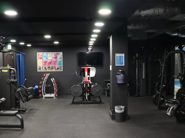 Gym equipment weights rack and television gym at Spring Mews in London Student Accommodation