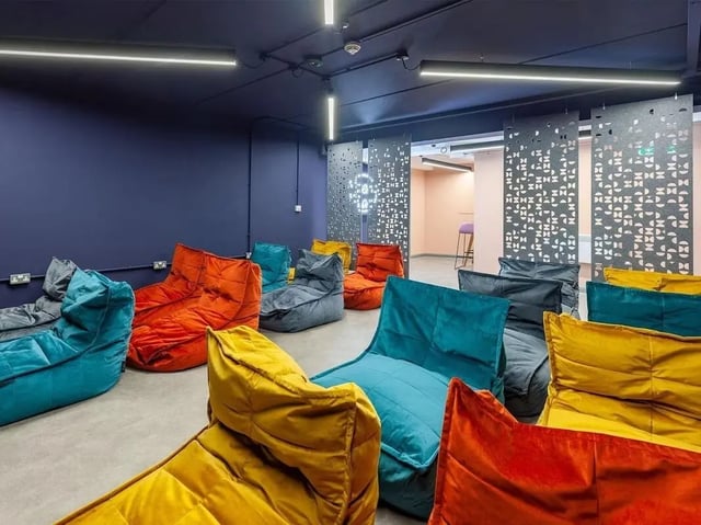 Colorful beanbags arranged in a common area. at Devonshire Courtyard in Sheffield Student Accommodation